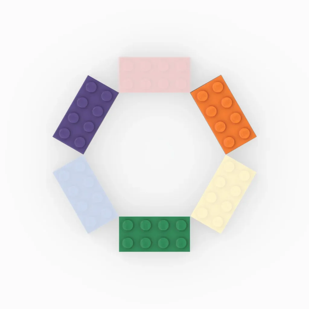 Green, orange, and purple. These 3 secondary colors are created when two primary colors are mixed together for lego bricks.