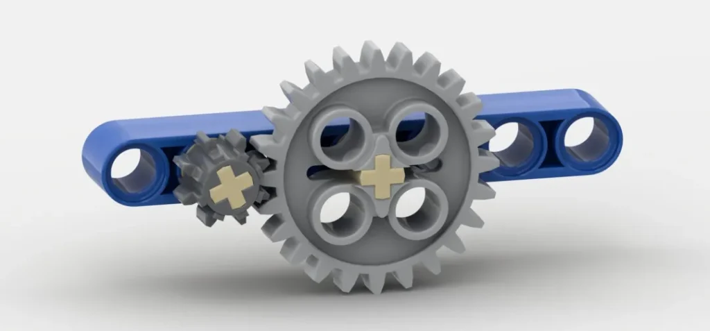 Small driving gear → larger output gear